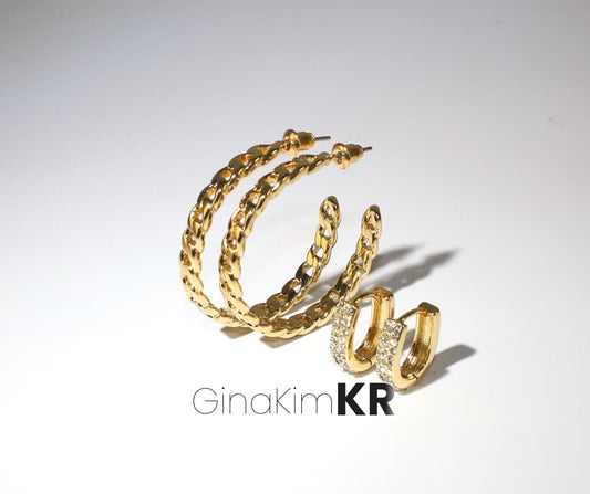 Two pairs of gold-tone hoop earrings from GinaKimKR, featuring bold chain design and pavé CZ details. Korean minimalist jewelry for everyday elegance.
