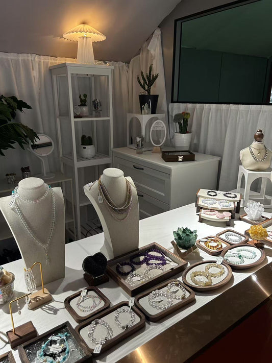 GinaKimKR popup store display at Hisense Plaza Qingdao, featuring elegant fortune jewelry under soft lighting