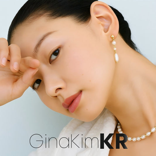 Close-up of a Korean woman wearing the Elegant Pearl Jewelry Gift Set with Harmony Light Bracelet and pearl drop earrings by GinaKimKR. Sophisticated and graceful style for meaningful gifting