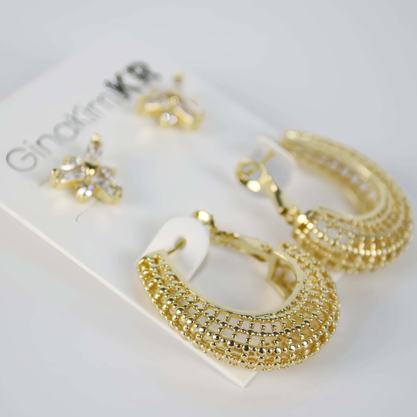 Gold hoop and CZ floral stud earring set displayed on GinaKimKR card – Royal Glow Duo Earring Set