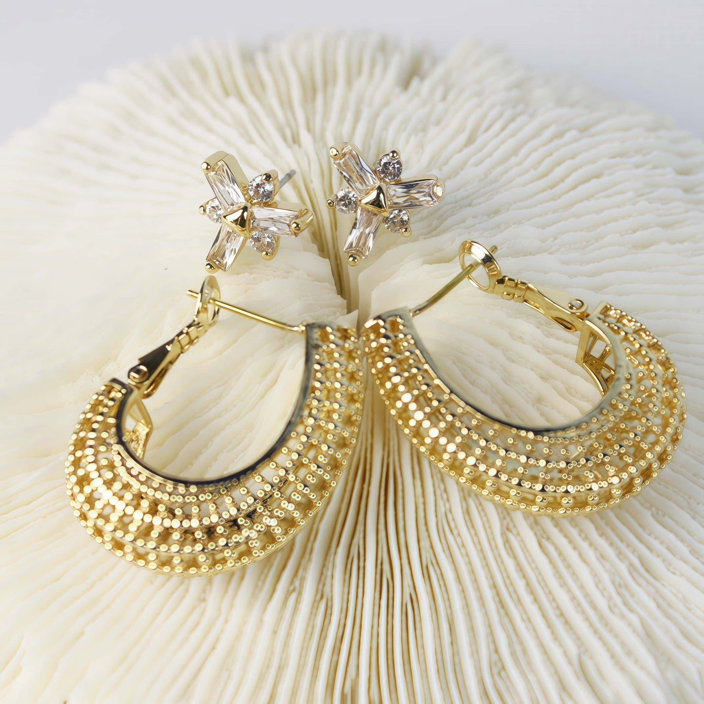 Front-facing view of gold beaded hoop earrings and CZ floral studs on ivory coral base – Royal Glow Duo Earring Set by GinaKimKR
