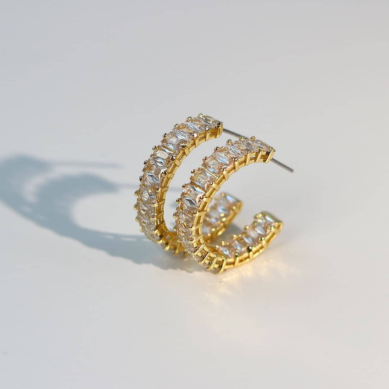 Celeste Crown Earrings displayed flat on white background, pair view.
