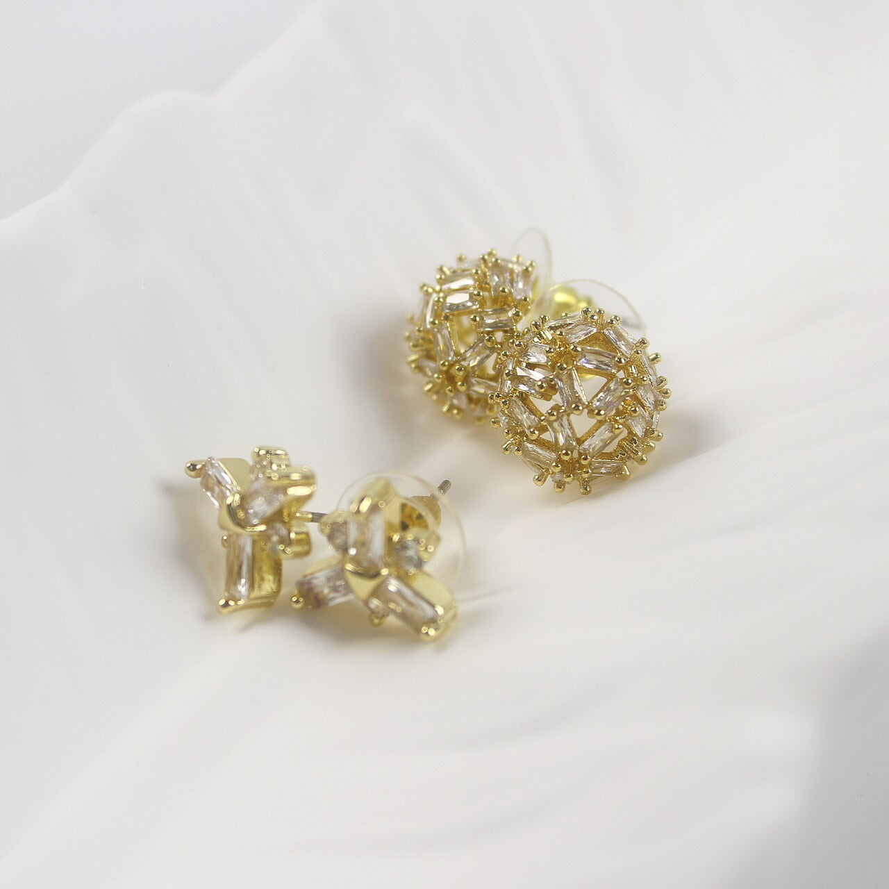 Crystal dome stud earrings paired with snowflake CZ studs, elegant duo set by GinaKimKR