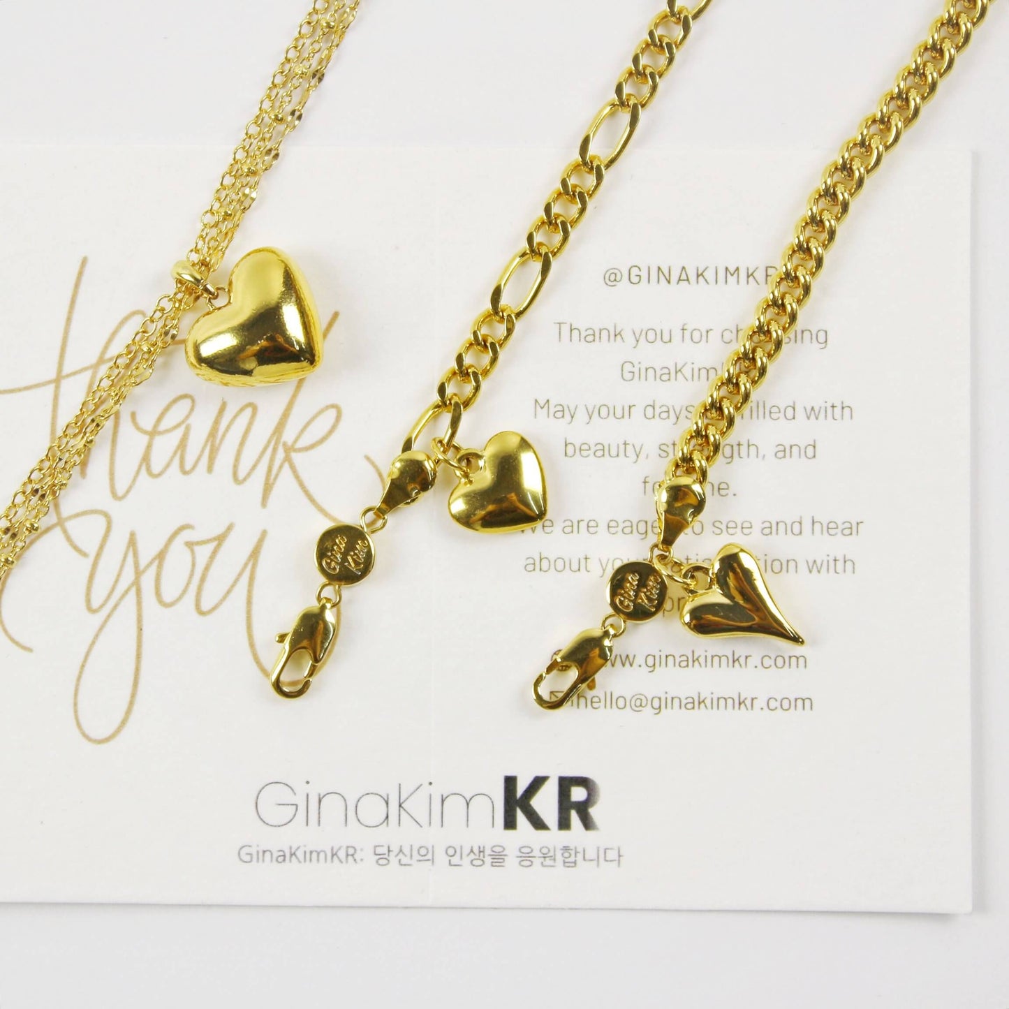 Evergold Figaro Heart Bracelet | GinaKimKR displayed with Twin-Link and Sharp Heart bracelets on thank you card.