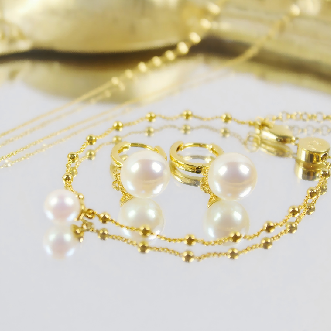 Evergold Pearl Dotted Bracelet and matching pearl earrings by GinaKimKR, crafted with 18kt waterproof plating