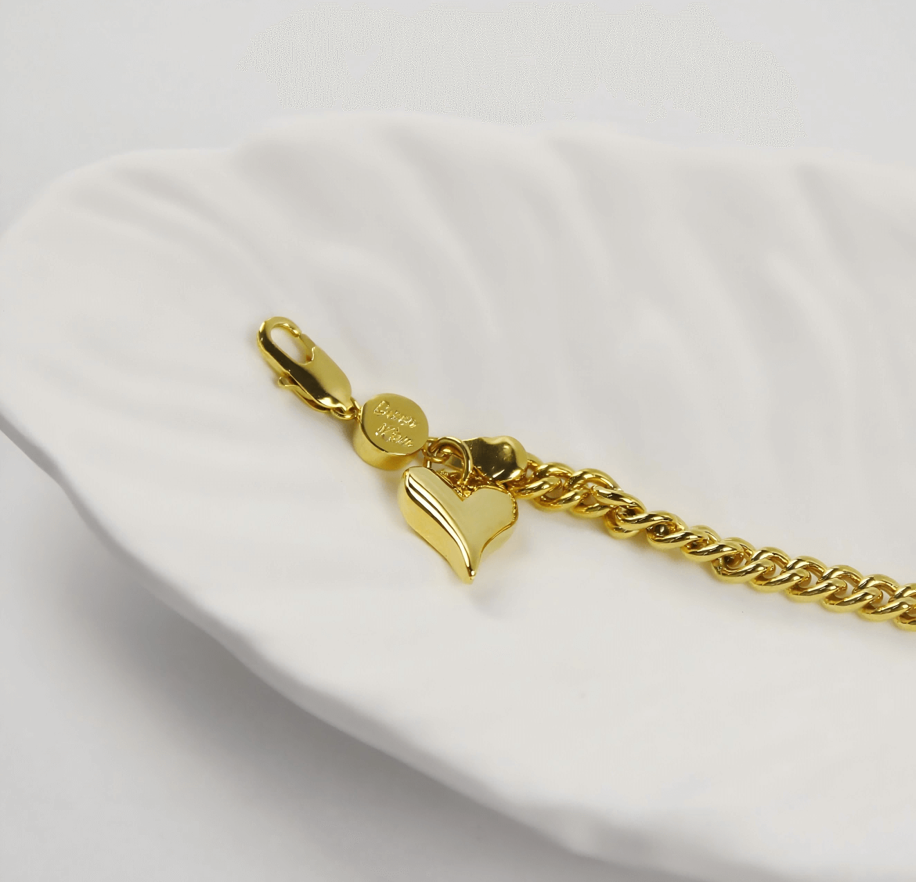 Side view of Evergold Twin-Link Heart Bracelet | by GinaKimKR with classic 18kt Evergold plating.