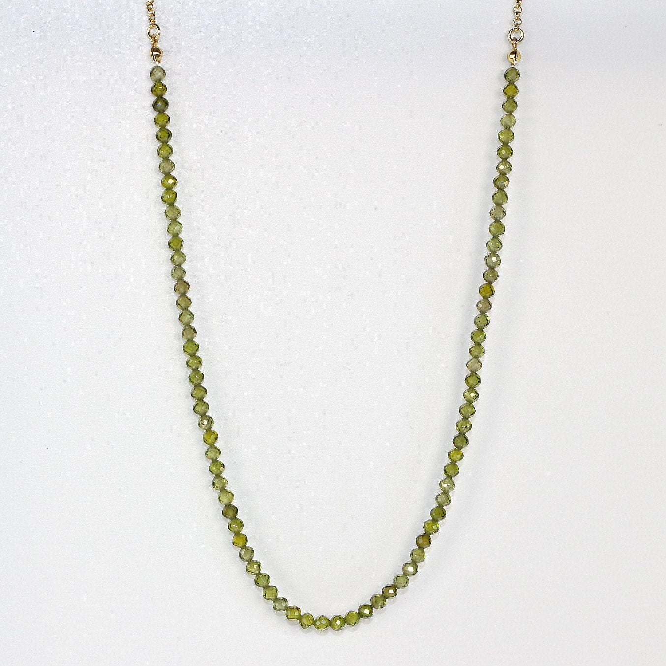 Forest green CZ necklace with faceted beads and gold-toned accents, elegant and calming. Handmade by GinaKimKR.