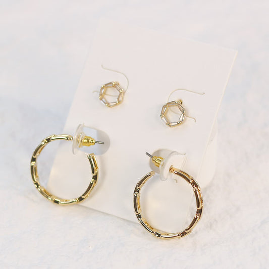 Geo Spark Earring Set with 8mm octagon CZ studs and 24mm gold hoops featuring cut-out patterns, displayed neatly on a white card.