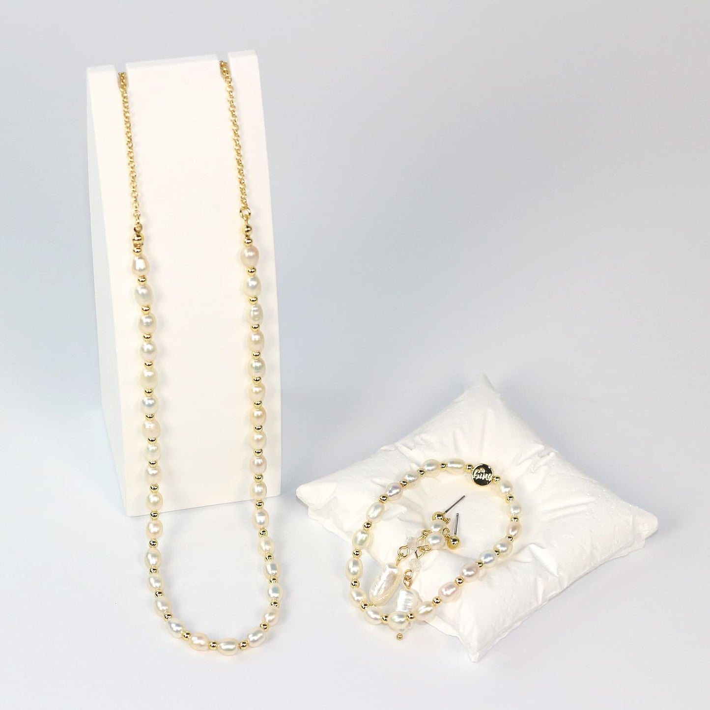Gina Kim pearl jewelry gift set featuring necklace, Pearl Whisper Bracelet, and baroque earrings in elegant gift box