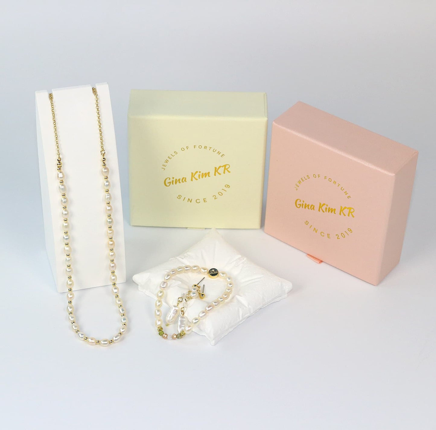 3-piece pearl jewelry gift set with necklace, Harmony Light bracelet, and baroque earrings displayed in elegant packaging