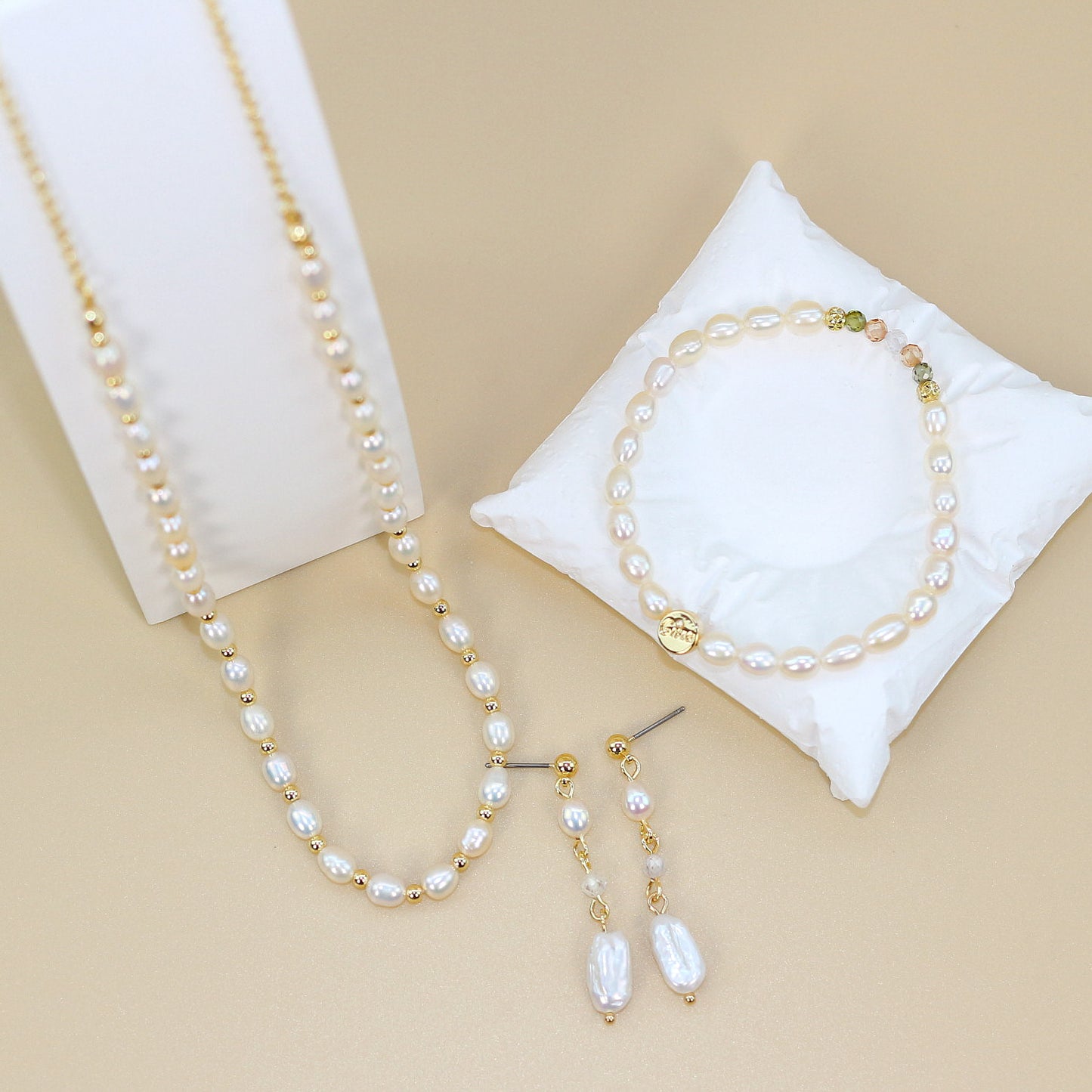 3-piece pearl jewelry gift set with necklace, Harmony Light bracelet, and baroque earrings displayed in elegant packaging