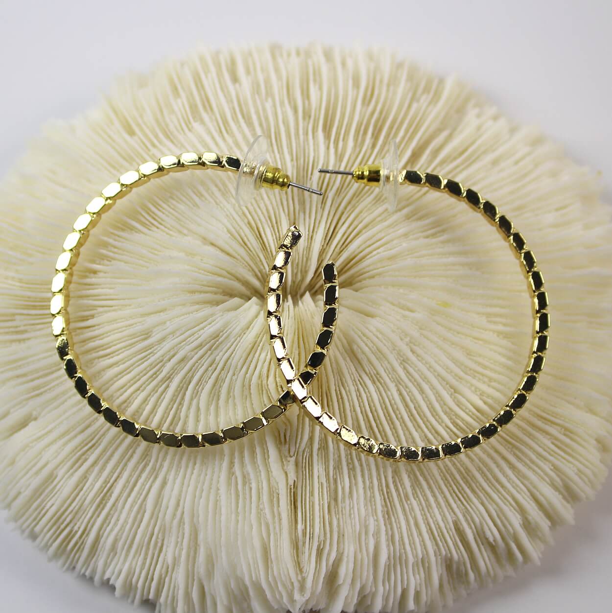 Side view of Golden Circle Duo Earring Set – 45mm gold hoops with round CZ studs, hypoallergenic posts