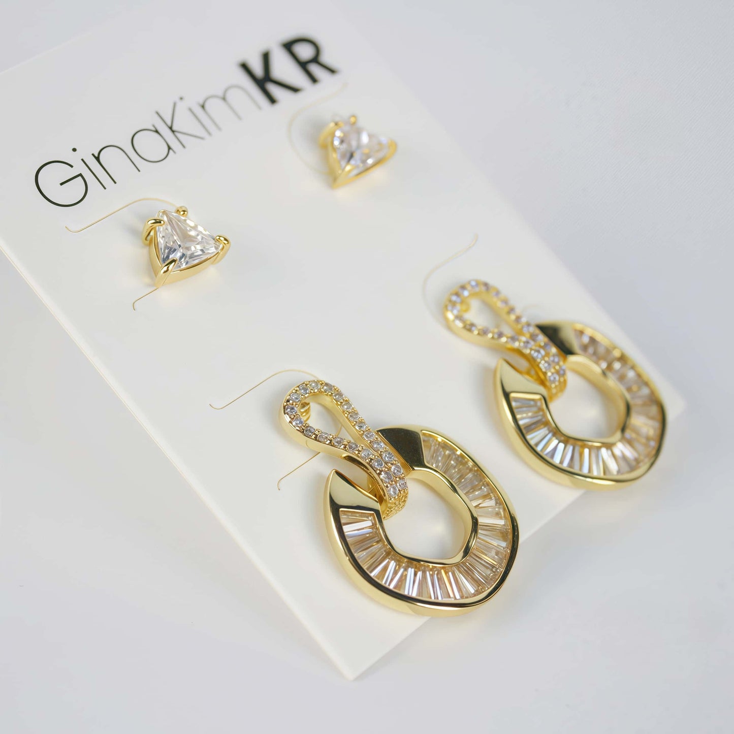 Full earring card of Golden Edge Duo by GinaKimKR, with triangle studs and loop earrings