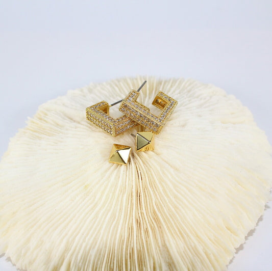 Close-up of square CZ-set earrings from Golden Structure Set – elegant and geometric design