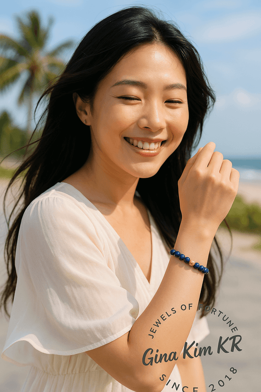 A person wearing the Lapis Lazuli Fortune Bracelet by GinaKimKR, featuring rich blue gemstone beads and silver-toned CZ details. Confident and timeless.