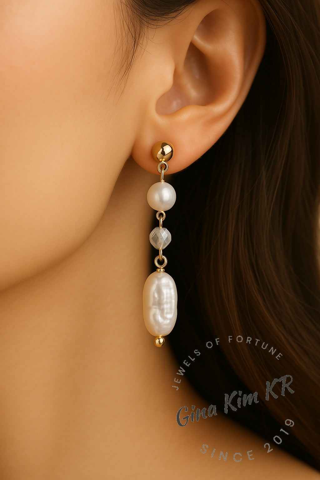 Side portrait of a woman wearing Golden Drop Baroque Pearl Earrings by GinaKimKR, showing off their luxurious drop design suitable for both formal and casual occasions.