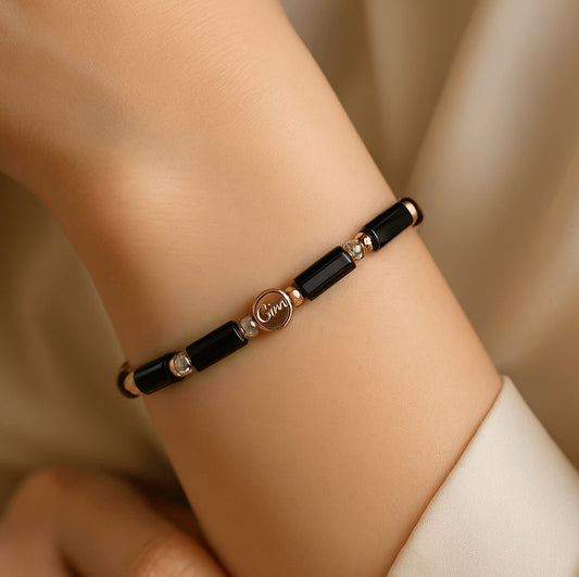 The Midnight Focus Onyx bracelet on a hand, an everyday reminder to stay centered and composed from GinaKim Jewelry
