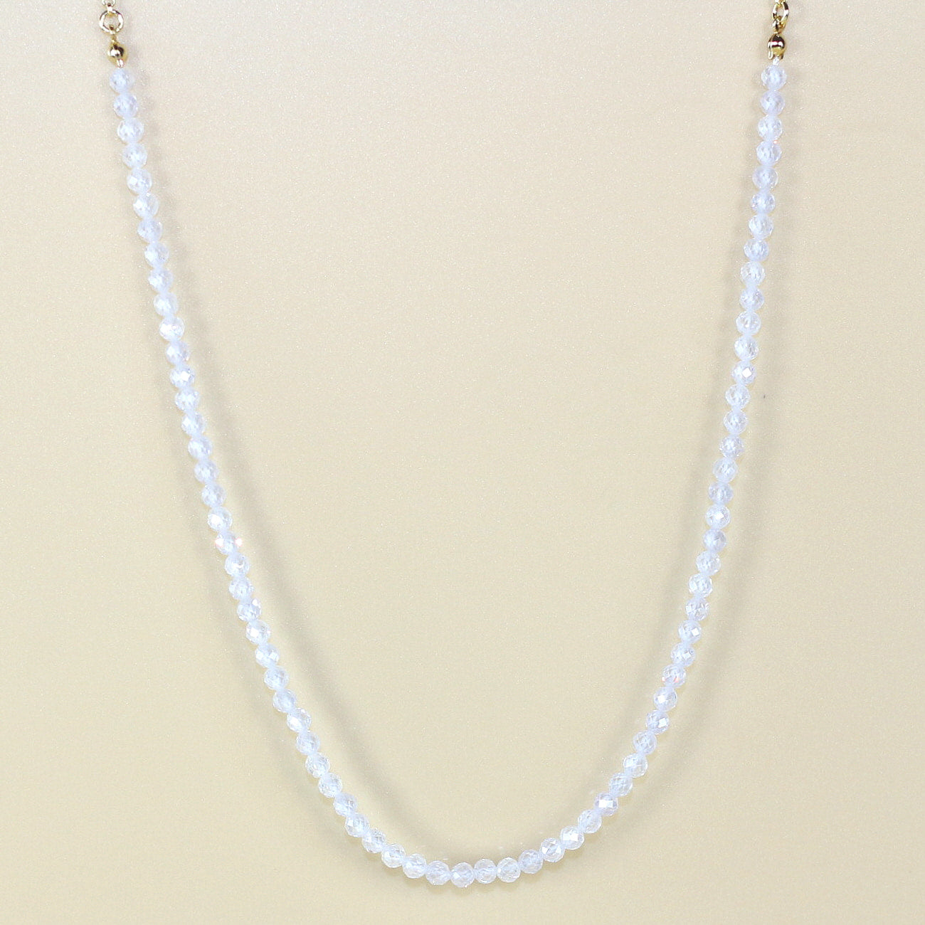 Clear crystal CZ necklace with gold-toned adjustable chain, inspired by morning light. Elegant, lightweight, and handmade by GinaKimKR.