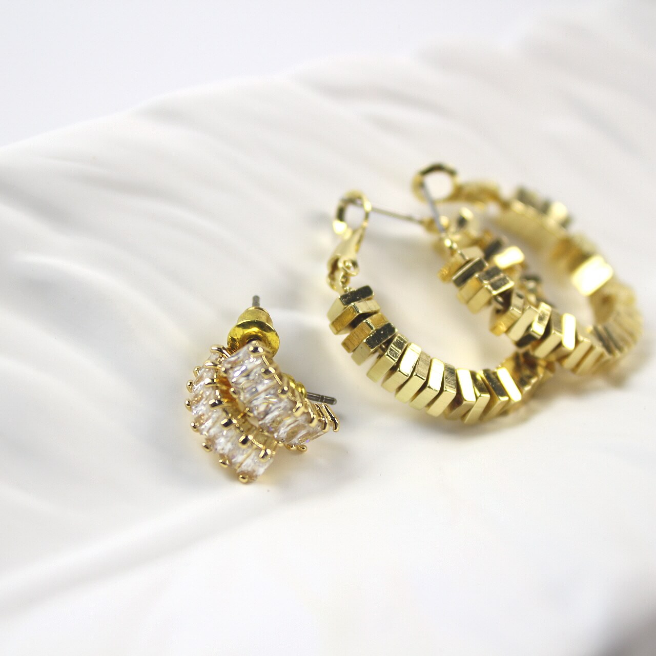 Side view of GinaKimKR Radiant Duo Earrings showing stacked gold hoops and CZ rectangle studs