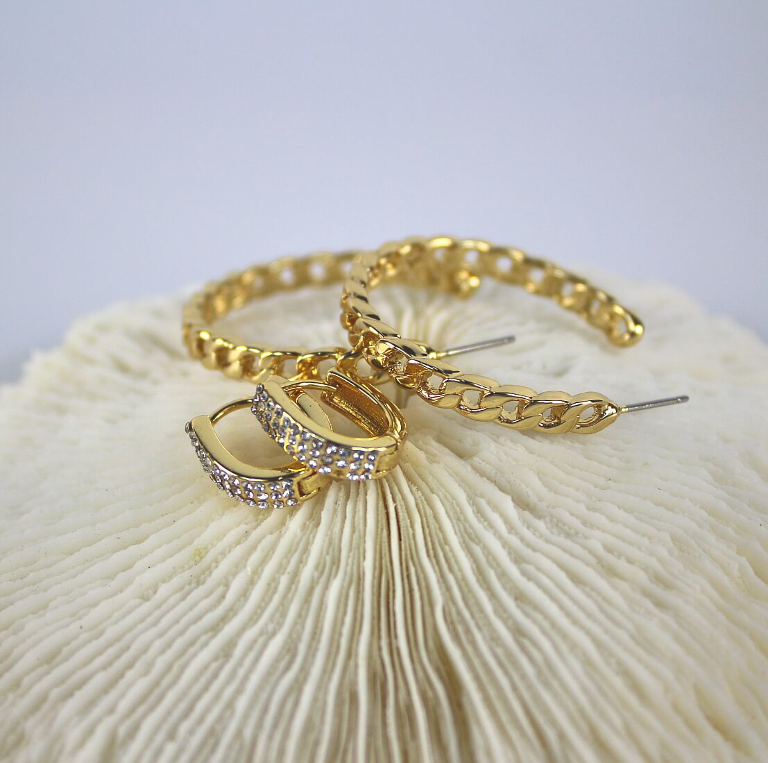 Close-up of gold chain-textured hoop earrings from the Urban Gleam Duo set by GinaKimKR