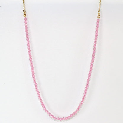 Full view of Blossom Light Necklace with pink CZ beads and gold chain