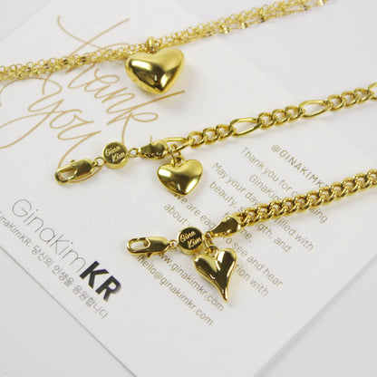 Evergold Figaro Heart Bracelet | GinaKimKR styled together with other Evergold Heart Bracelets on card display.