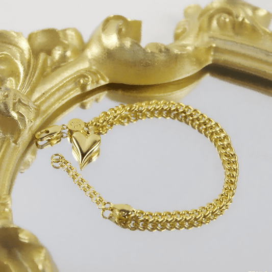 Evergold Twin-Link Heart Bracelet | by GinaKimKR styled with ornate golden frame mirror background.