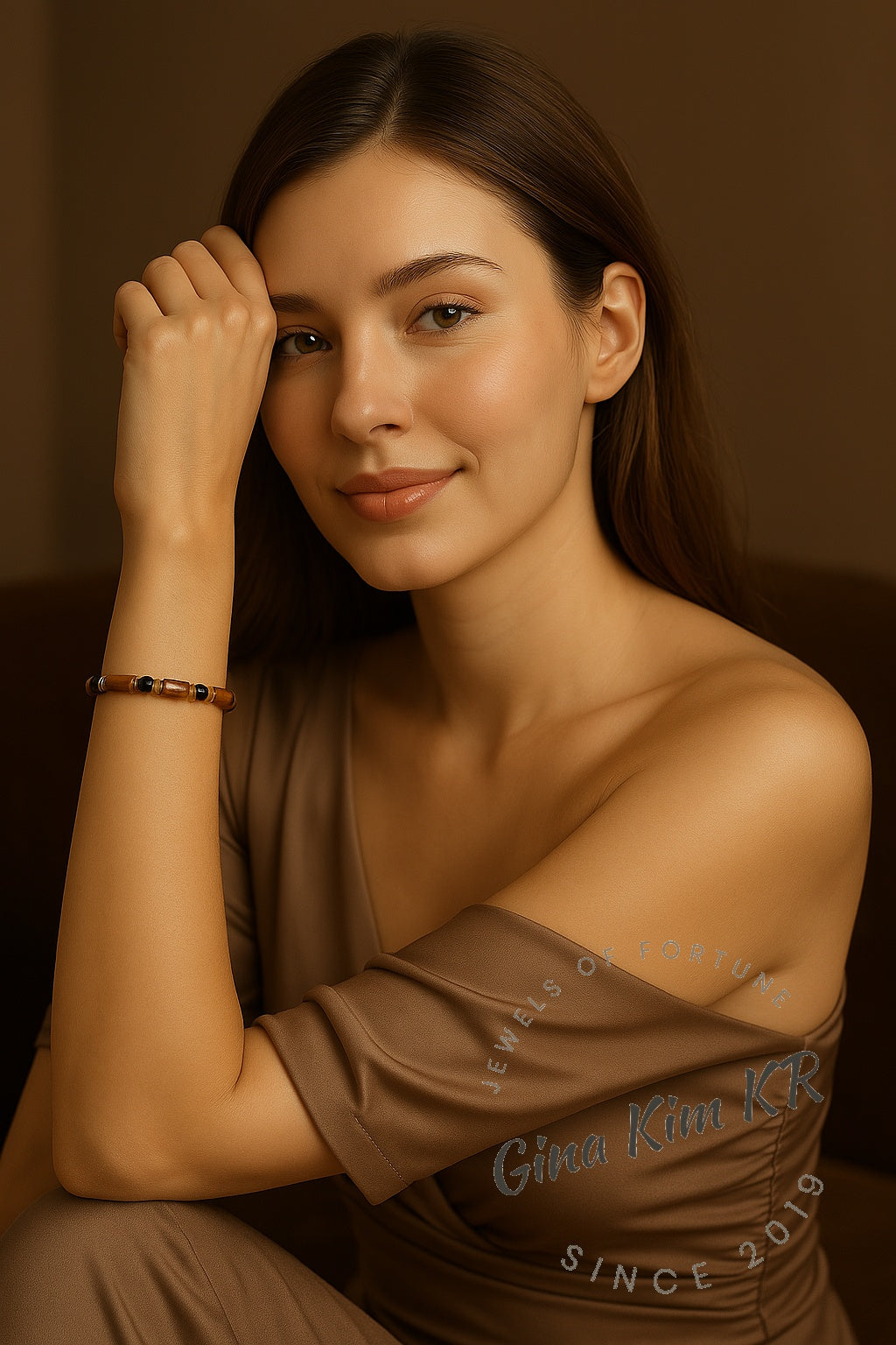 GinaKim Focus Strength Bracelet featuring natural Tiger's Eye and Onyx beads, with gold-plated accents and a stretch design for a luxurious, empowering look
