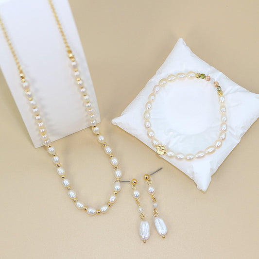 3-piece pearl jewelry gift set with necklace, Harmony Light bracelet, and baroque earrings displayed in elegant packaging