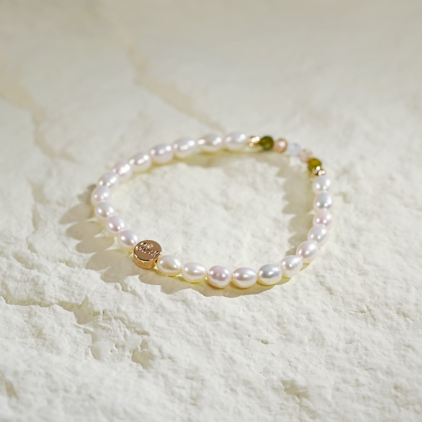 Flat-lay view of the Harmony Light Bracelet with gold accents and round pearls, highlighting its delicate balance of light, texture, and Korean handmade detail.