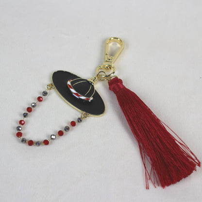 Full view of the Joseon Crimson Guardian Key Ring featuring a Korean Satto hat motif with red beadwork and a crimson tassel.