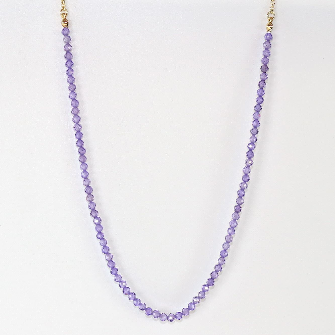 Full view of the Lavender Light Necklace made with 4mm faceted purple CZ beads, showcasing its minimalist design by GinaKimKR.