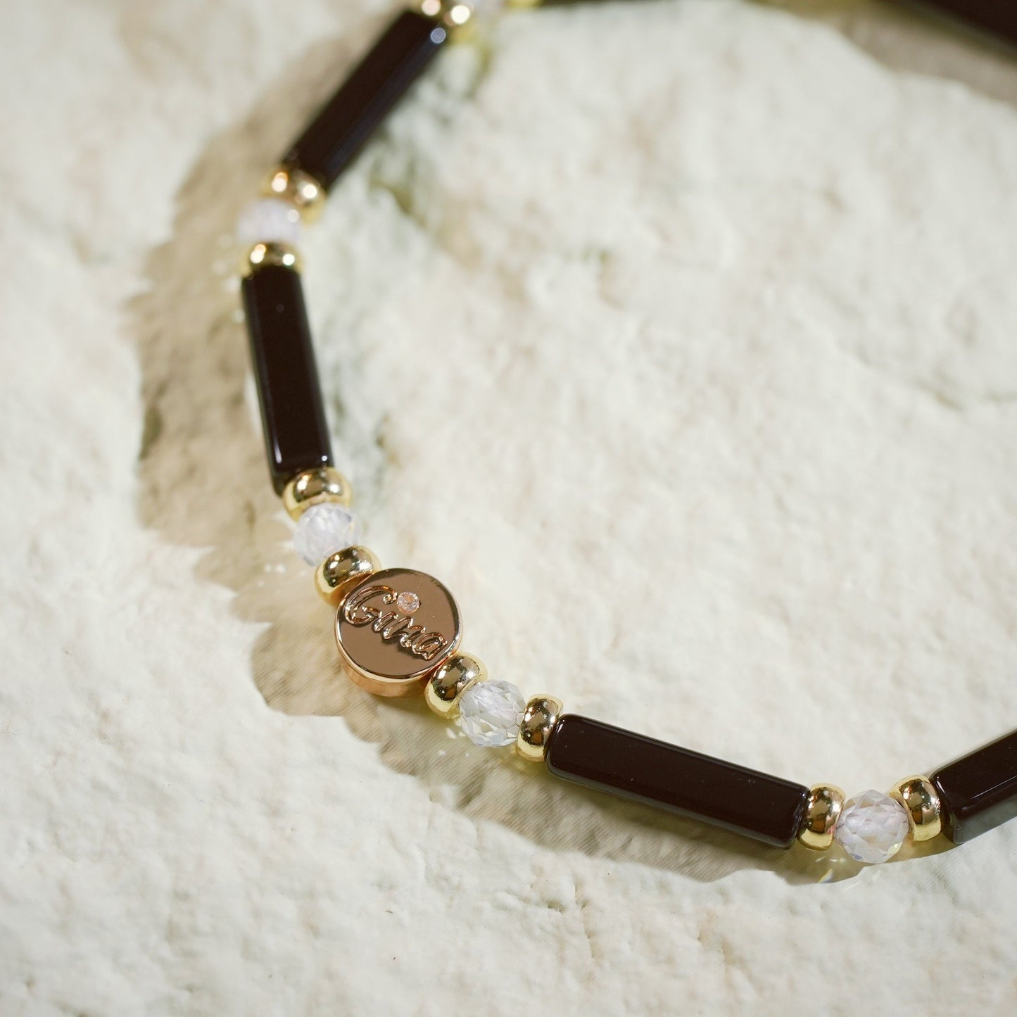 Close-up view of black onyx and crystal bead arrangement from the Midnight Focus Bracelet.