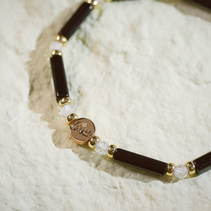 Close-up view of black onyx and crystal bead arrangement from the Midnight Focus Bracelet.
