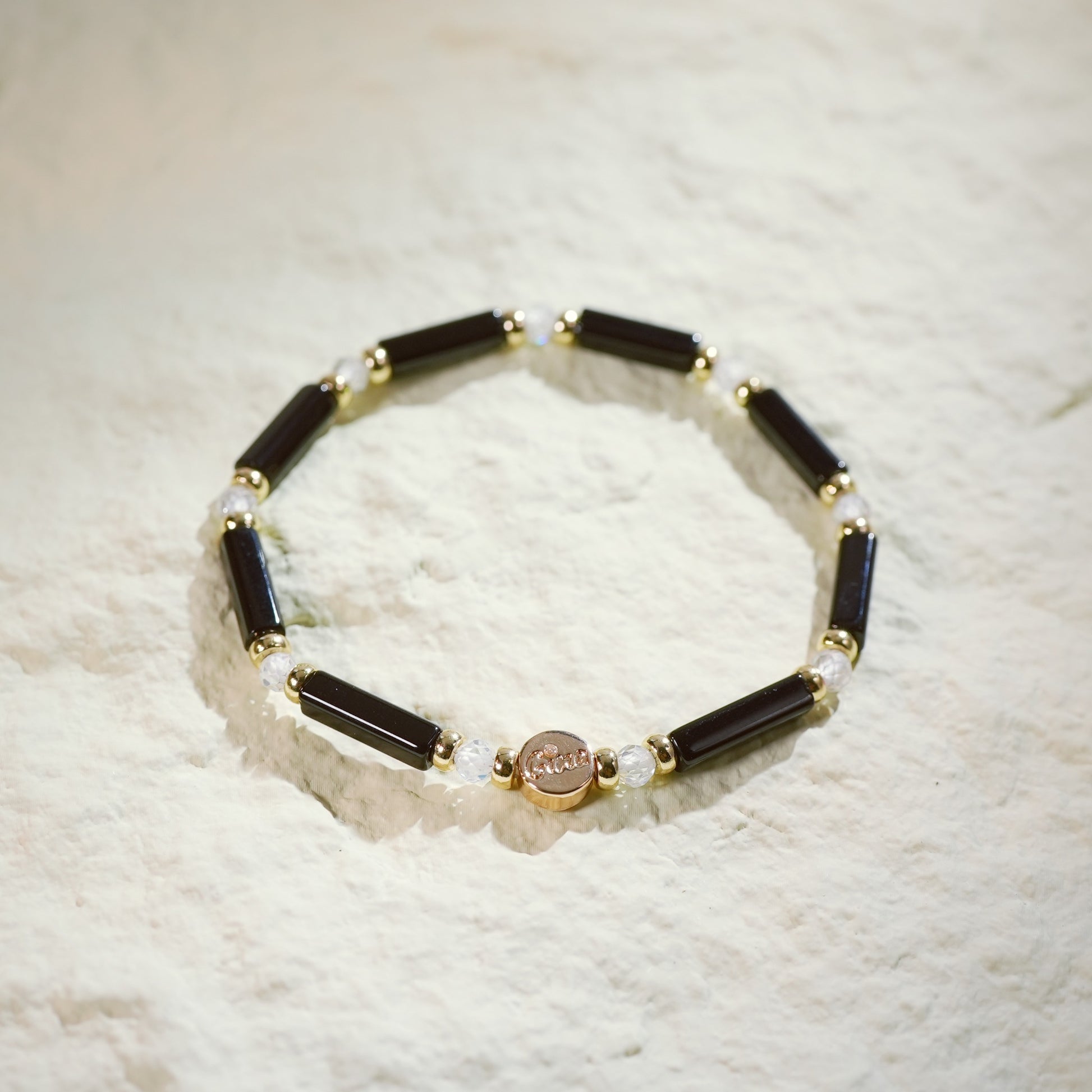 Minimalist onyx bar bead bracelet with Crystal CZ ball & GinaKim gold-plated charm, unisex stretch design
