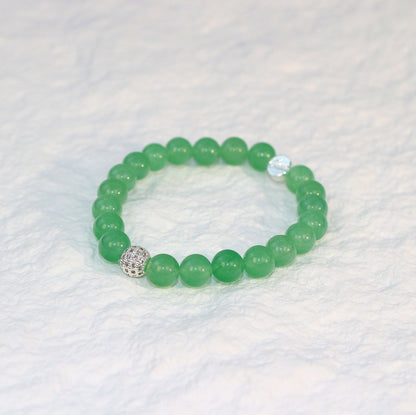 Front-facing image of the Peridot Strength Bracelet emphasizing bead consistency and vivid lime green color, displayed on a white background.