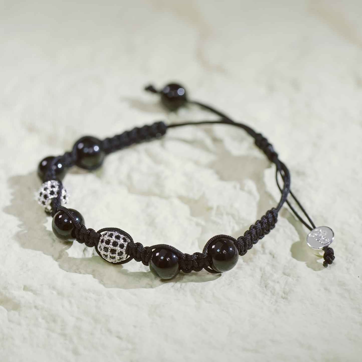 GinaKim Shadow Guard Bracelet featuring Onyx and CZ beads, designed for protection, strength, and style with a minimalist yet powerful look