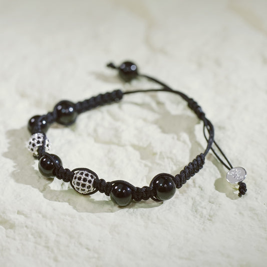 GinaKim Shadow Guard Bracelet featuring Onyx and CZ beads, designed for protection, strength, and style with a minimalist yet powerful look