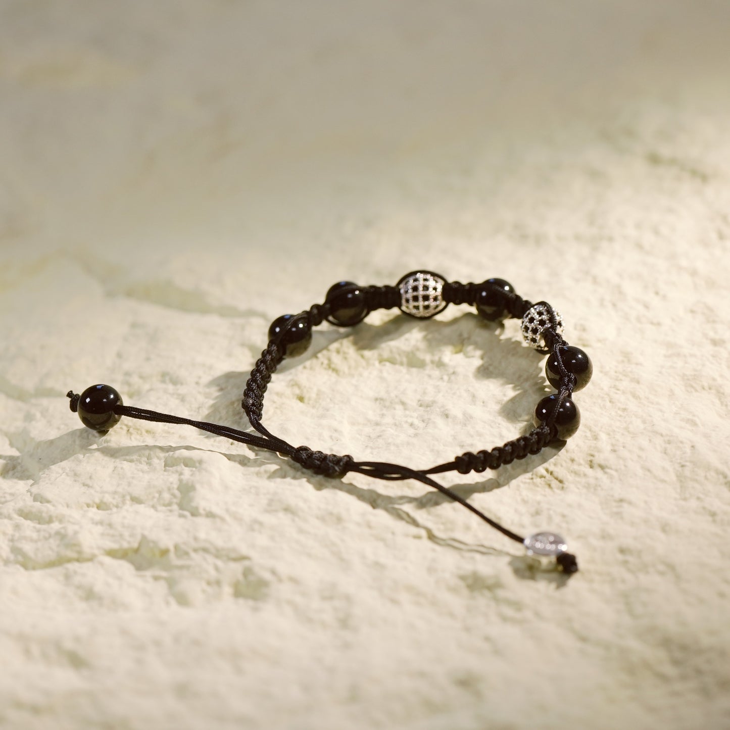 GinaKim Shadow Guard Bracelet featuring Onyx and CZ beads, designed for protection, strength, and style with a minimalist yet powerful look