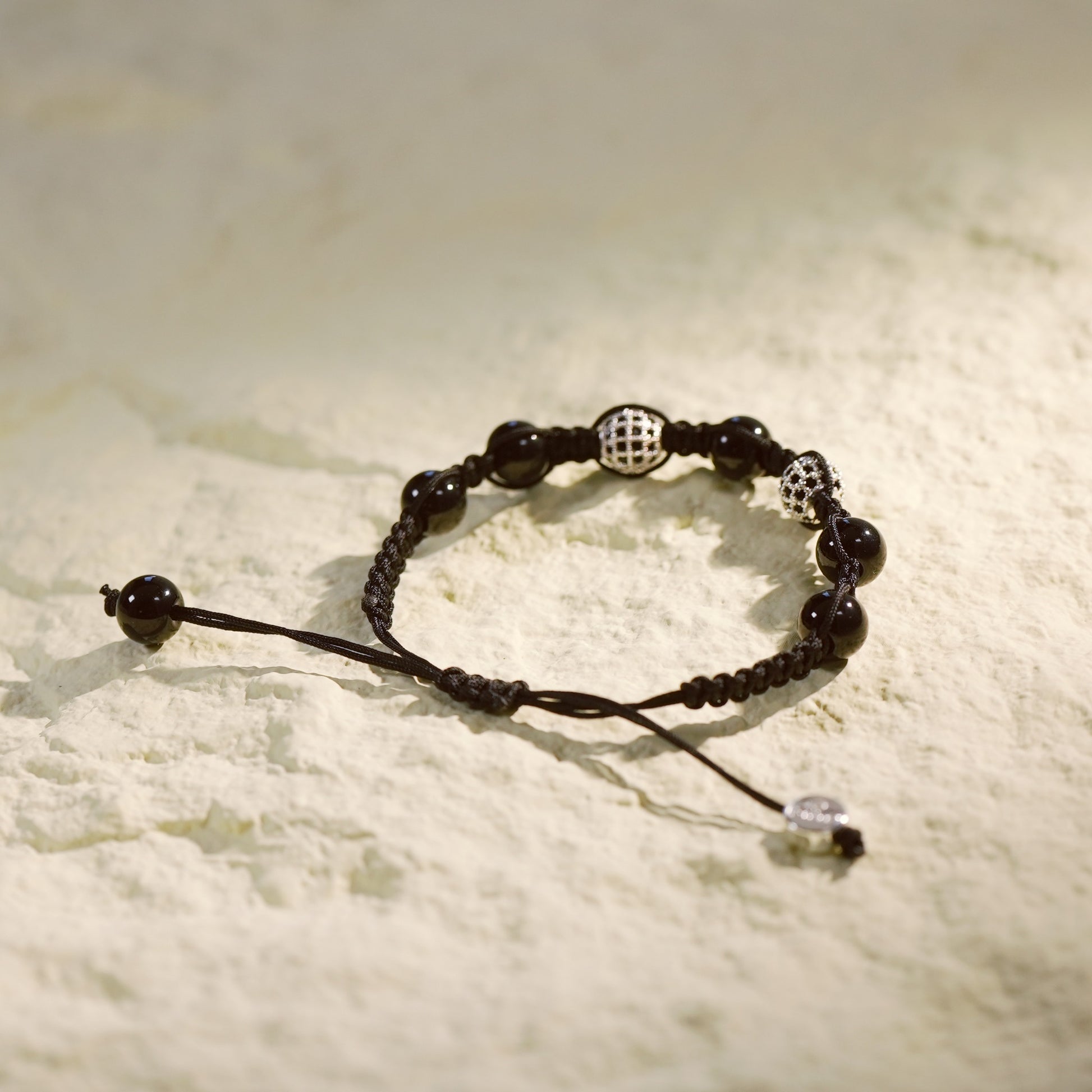 GinaKim Shadow Guard Bracelet featuring Onyx and CZ beads, designed for protection, strength, and style with a minimalist yet powerful look